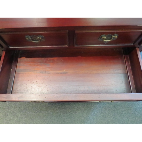 1029 - A Georgian style mahogany bureau, the drop-flap revealing a fitted interior, two short over three lo... 