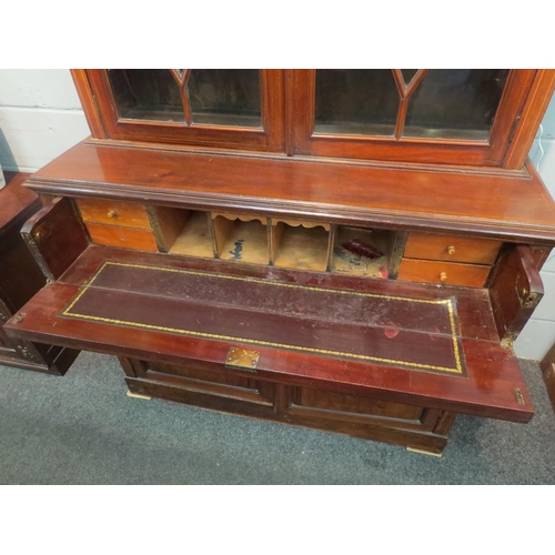 1052 - A mahogany secretaire bookcase with astragal glazed upper section, single drawer over twin door cupb... 