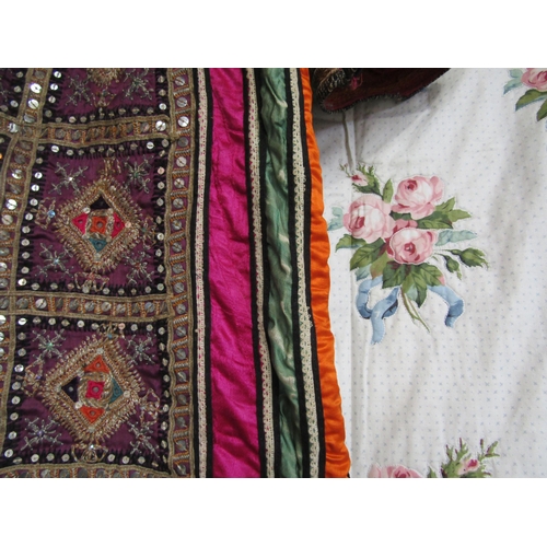 1078 - An early 20th Century Indian lady's tunic, the tunic is heavily embroidered with mirror roundels and... 