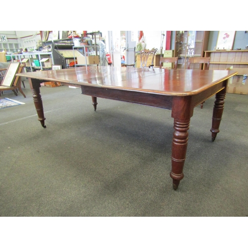 1144 - A mahogany extending dining table with two additional leaves, turned legs on castors, 72cm high x 20... 