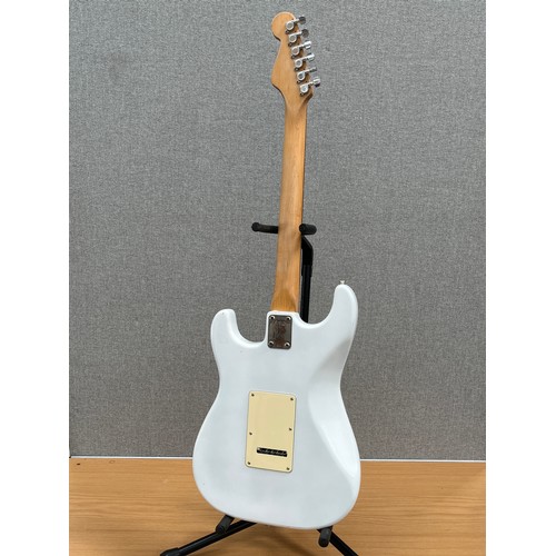 1167 - A Stratocaster style handmade electric guitar, white body with cream hardware