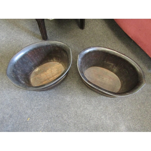 1028 - A pair of possibly Chinese hardwood brass banded planters on raised feet, 20cm high x 33cm long