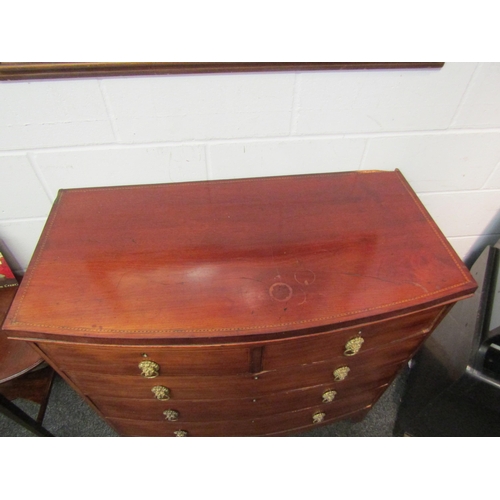 1069 - A Victorian mahogany bow fronted chest of two short over three long drawers, lion mask handles, outs... 