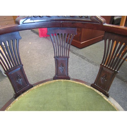 1098 - An Edwardian mahogany corner chair, scrolled foliate carved back rest over pierced splats, upholster... 