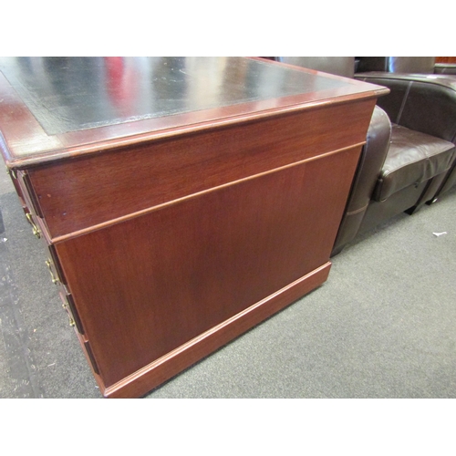 1103 - A Victorian nine drawer mahogany desk with original leather insert and brass handles, 76cm high x 15... 