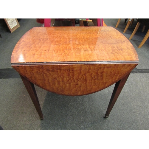 1108 - A Georgian figured walnut drop leaf table with inlaid stringing, single end drawer and on square tap... 