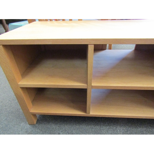 1134 - A modern oak shelved TV unit, 50cm high x 117cm wide x 43cm deep