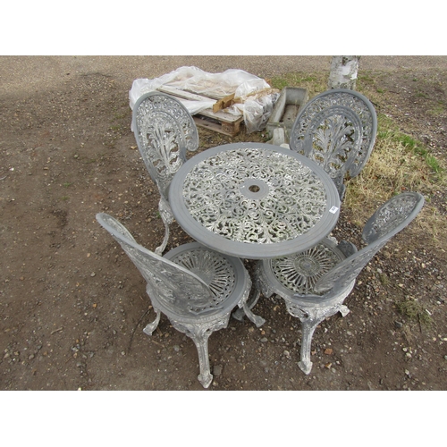 3527 - A painted alloy table and four chairs