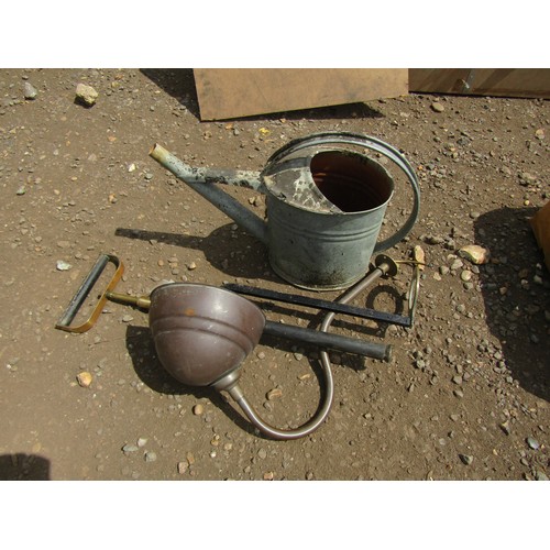 3541 - A galvanised watering can, stirrup pump and a copper light