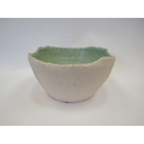 1120 - A Studio Pottery bowl with pale green interior, 26cm diameter