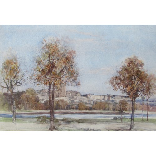 7047 - GEORGE ROBERT RUSHTON (1869-1947) A framed and glazed watercolour depicting an Autumnal view across ... 