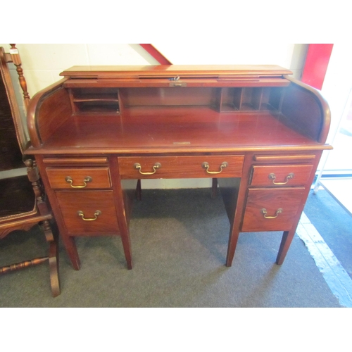 1008 - A 20th Century five drawer tambour front desk, 94cm high x 121cm wide x 71cm deep