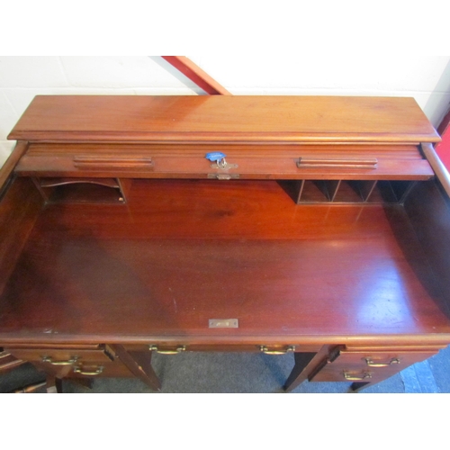 1008 - A 20th Century five drawer tambour front desk, 94cm high x 121cm wide x 71cm deep