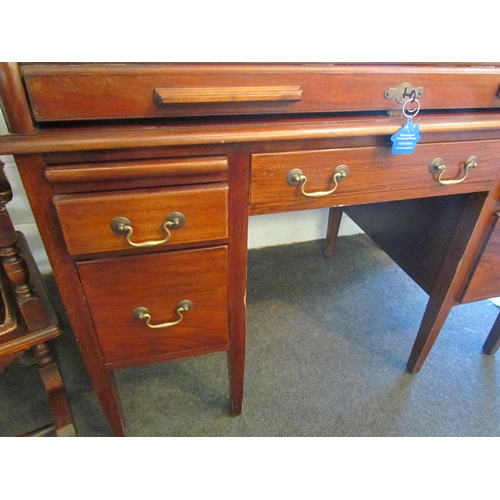 1008 - A 20th Century five drawer tambour front desk, 94cm high x 121cm wide x 71cm deep