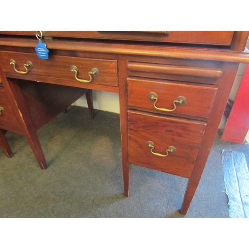 1008 - A 20th Century five drawer tambour front desk, 94cm high x 121cm wide x 71cm deep