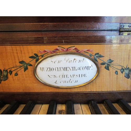 1016 - A late 19th Century mahogany string inlaid harpsichord on castors, 