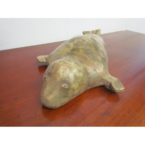 1085 - A pottery figure of a seal, 49cm long
