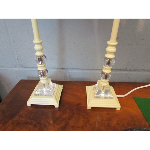 1090 - A pair of cream and glass candle form table lamps with cream pleated shades     (R) £15