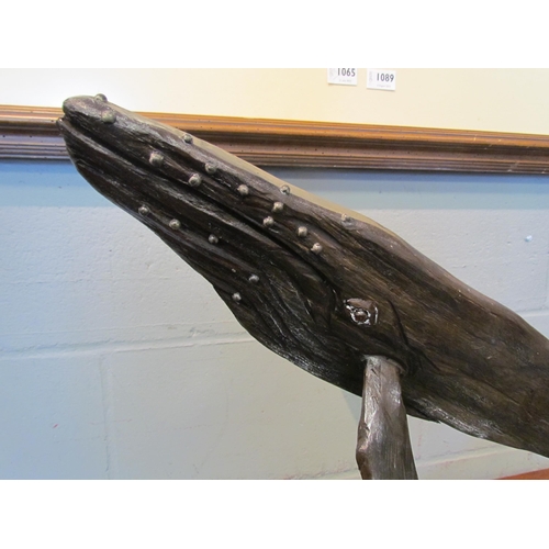 1091 - A driftwood whale sculpture, 49cm high x 80cm long