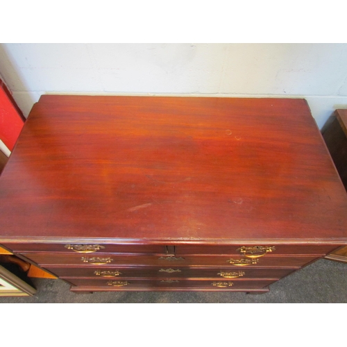 1095 - A George III mahogany chest of two short over three graduating long drawers on bracket feet, 91cm hi... 