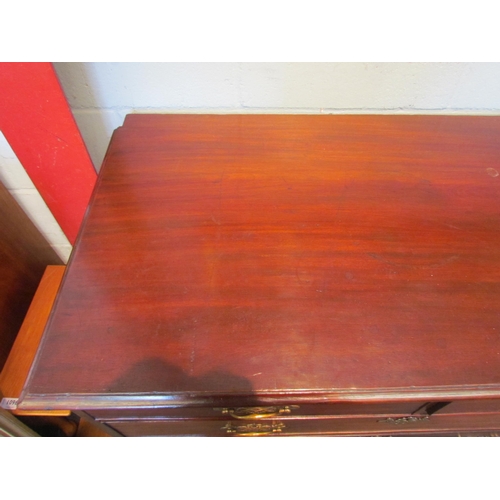 1095 - A George III mahogany chest of two short over three graduating long drawers on bracket feet, 91cm hi... 