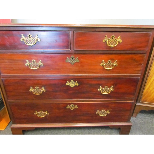 1095 - A George III mahogany chest of two short over three graduating long drawers on bracket feet, 91cm hi... 