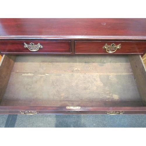 1095 - A George III mahogany chest of two short over three graduating long drawers on bracket feet, 91cm hi... 