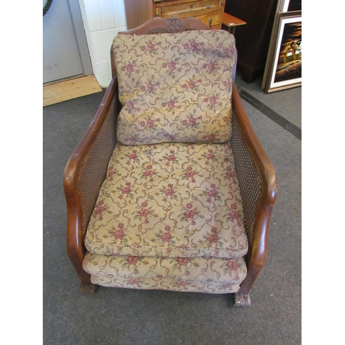1101 - A bergere open armchair on castors, bergere a/f to one side   (R) £20