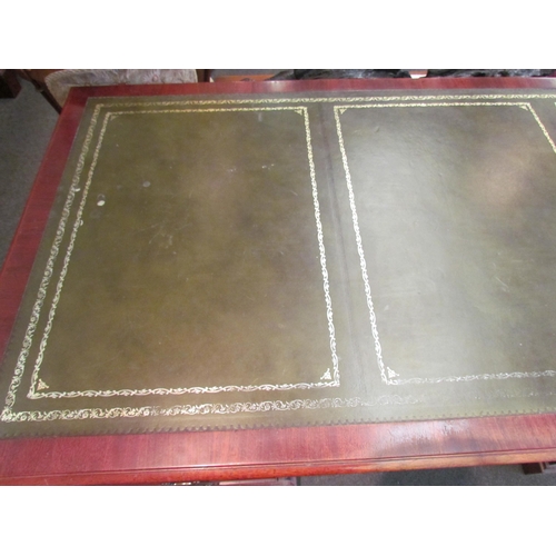 1111 - A Norfolk Manor twin pedestal mahogany desk, seven drawers, gilt tooled green leather insert, 77cm h... 