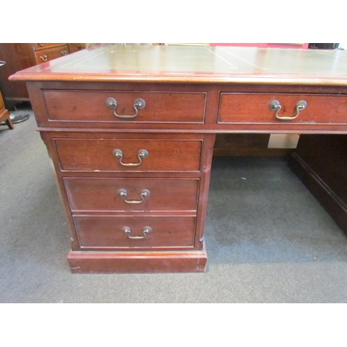 1111 - A Norfolk Manor twin pedestal mahogany desk, seven drawers, gilt tooled green leather insert, 77cm h... 