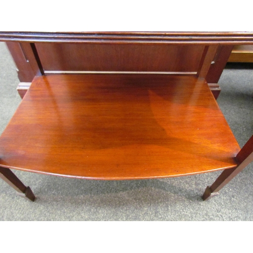 1114 - An Edwardian mahogany side table with two short over single long drawer, under-tier and on spade fee... 