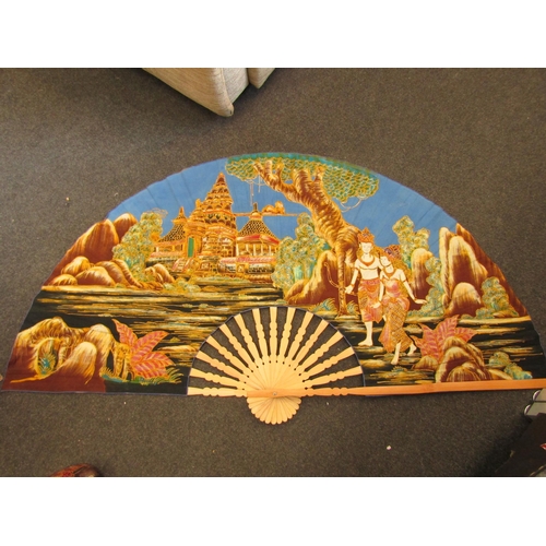 1174 - An oversized Bali style fan with another similar example and three balsa wood masks (5)