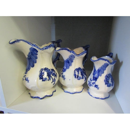 1280 - A collection of blue and white transfer ware to include graduating jugs, tureen lacking cover, small... 