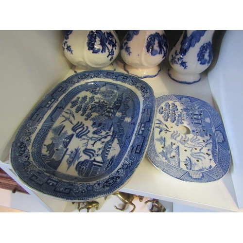 1280 - A collection of blue and white transfer ware to include graduating jugs, tureen lacking cover, small... 