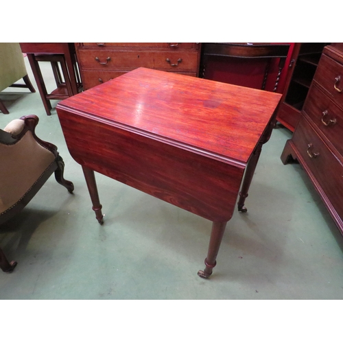 4001 - A George III flame mahogany table. The rising leaves over a single end drawer over turned tapering l... 