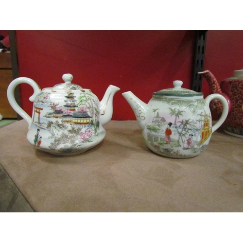 4005 - A small selection of mostly Oriental teapots and bargeware example (8)   (R) £10