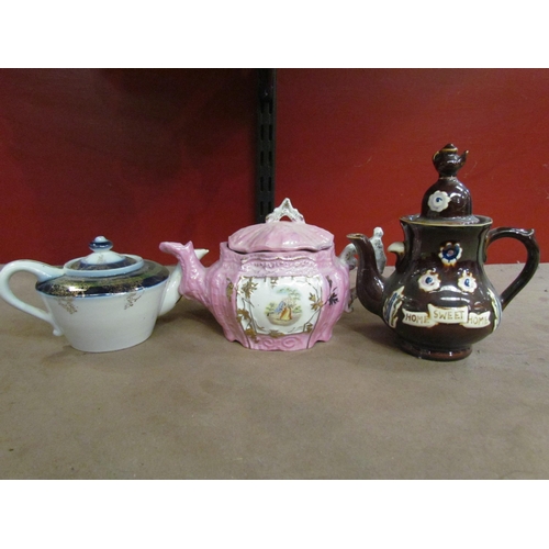 4005 - A small selection of mostly Oriental teapots and bargeware example (8)   (R) £10