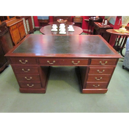 4079 - A Victorian nine drawer mahogany desk with original leather insert and brass handles, 76cm high x 15... 