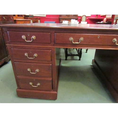 4079 - A Victorian nine drawer mahogany desk with original leather insert and brass handles, 76cm high x 15... 