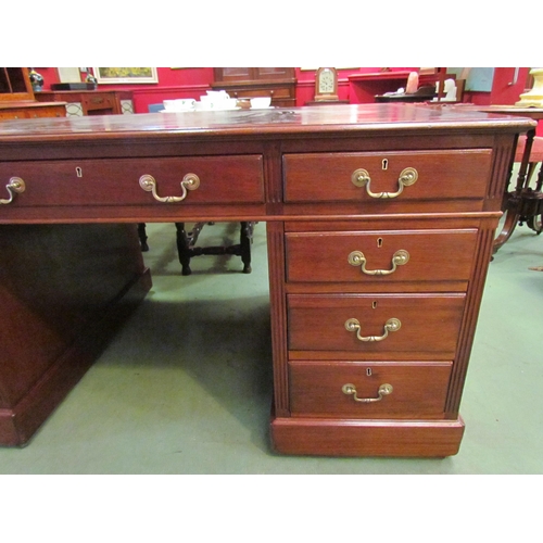 4079 - A Victorian nine drawer mahogany desk with original leather insert and brass handles, 76cm high x 15... 