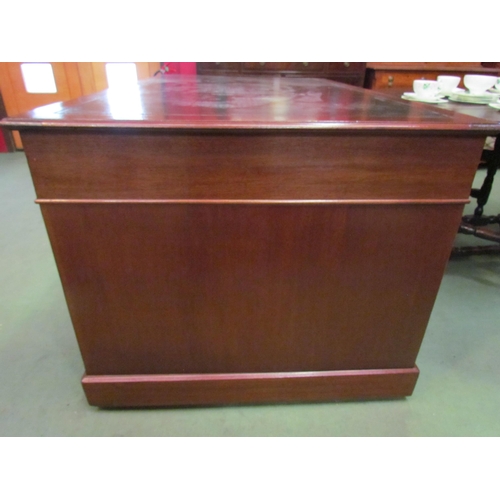 4079 - A Victorian nine drawer mahogany desk with original leather insert and brass handles, 76cm high x 15... 