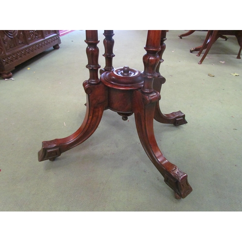 4118 - A mid Victorian inlaid burr walnut oval top lamp table over turned and carved supports, the outswept... 