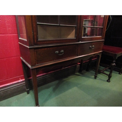 4152 - An Edwardian mahogany inlaid display cabinet with three shelves, glazed doors and sides, over two dr... 