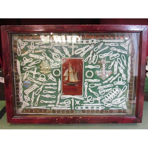 4199 - A glazed case containing knots, bands of old pennies and farthings, 52cm x 78cm      (E) £10-20