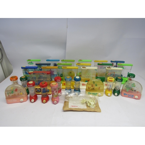 A collection of unboxed Tomy water games including Disney Snow
