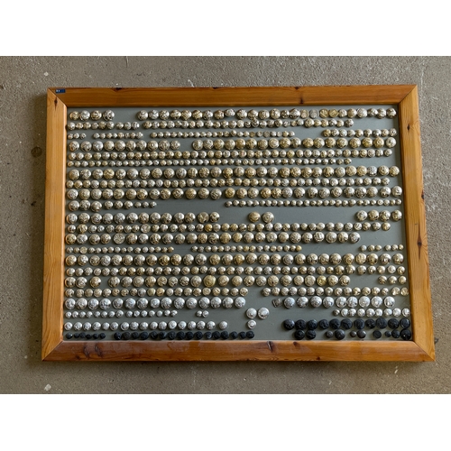 9175 - A framed display of a large collection of staybrite buttons, various regiments including Yeomanry an... 