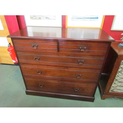 4030 - A Circa 1900 walnut chest of two short over three graduating long drawers with reeded decoration and... 