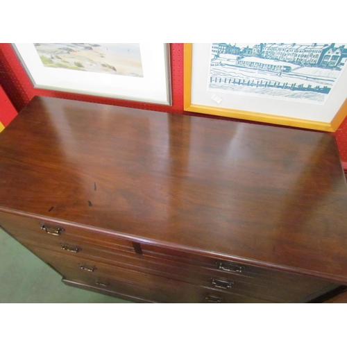 4030 - A Circa 1900 walnut chest of two short over three graduating long drawers with reeded decoration and... 