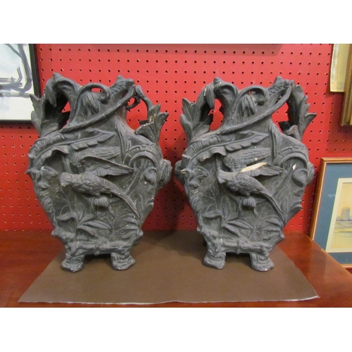 4046 - A pair of W.S. & S moulded ceramic vases decorated with parrot, damage present, 31cm tall