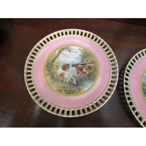 4112 - A pair of Royal Worcester Victorian hand-painted ribbon plates both painted by R.F. Perling,